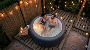 Couple relaxing in styled inflatable hot tub on backyard patio at dusk
